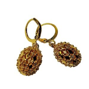 Gold plated copper drop earrings shaped like hollow balls